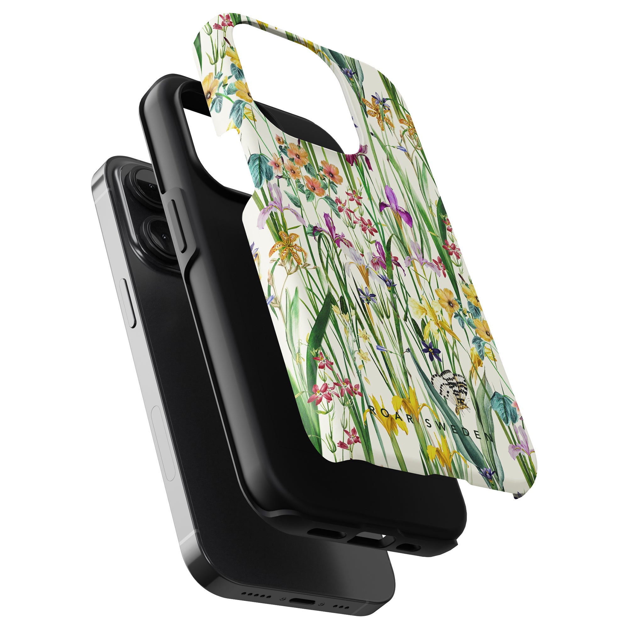 A smartphone with a Blooming Meadow - Tough Case next to a black wireless charging pad with cushioned support.