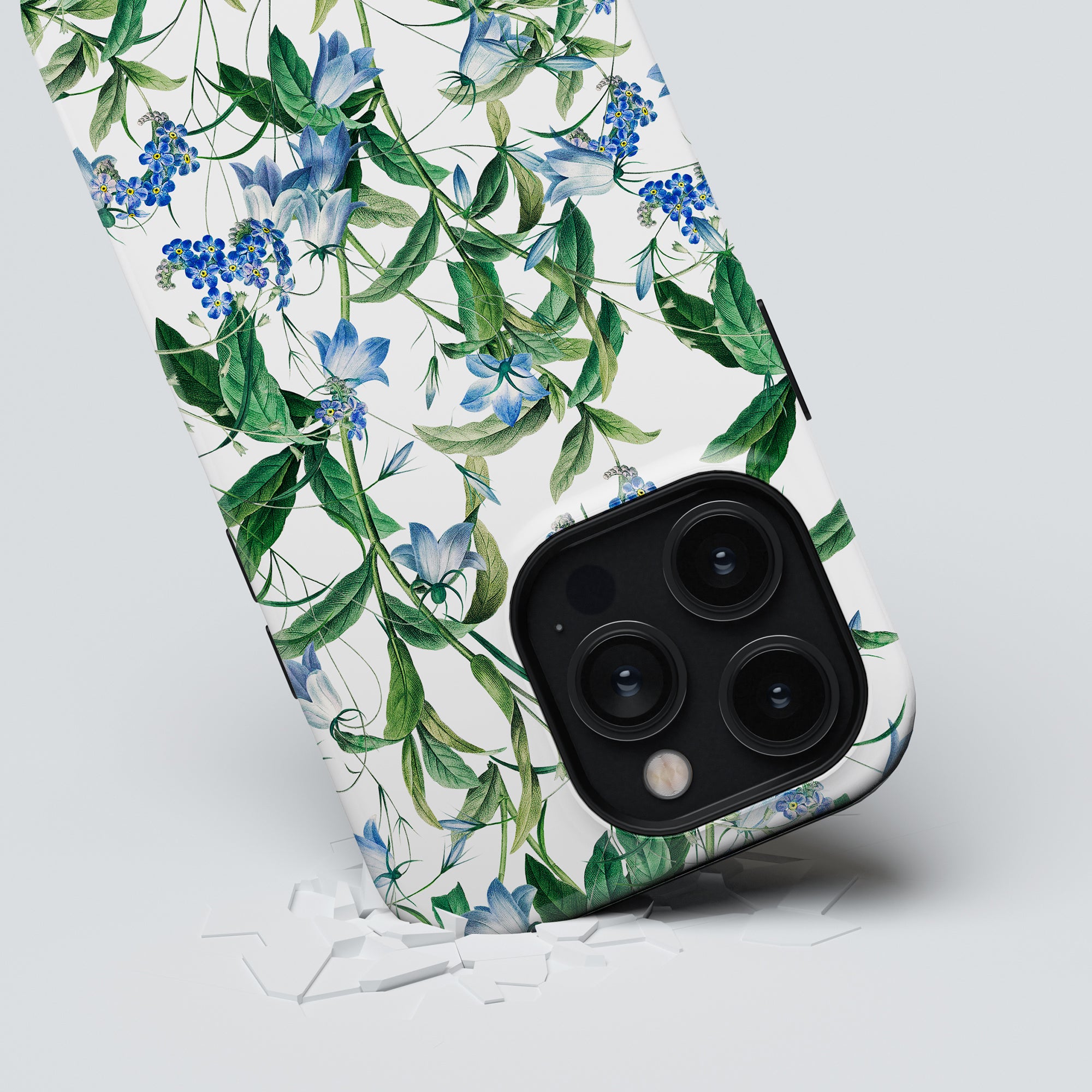 Modern smartphone with a Blue Bells - Tough Case peeling away to reveal camera lenses.