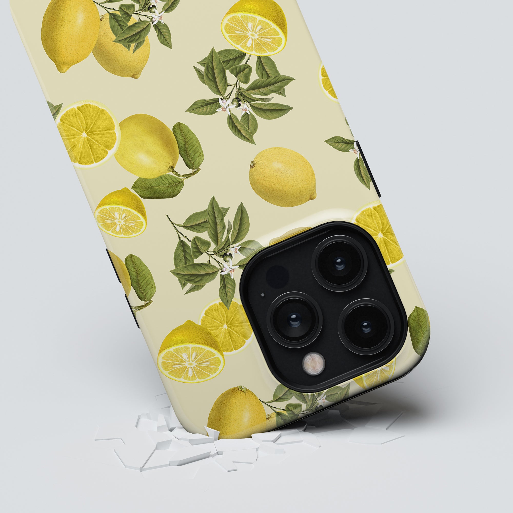 A smartphone with a Limon - Tough Case lying on a cracked surface.