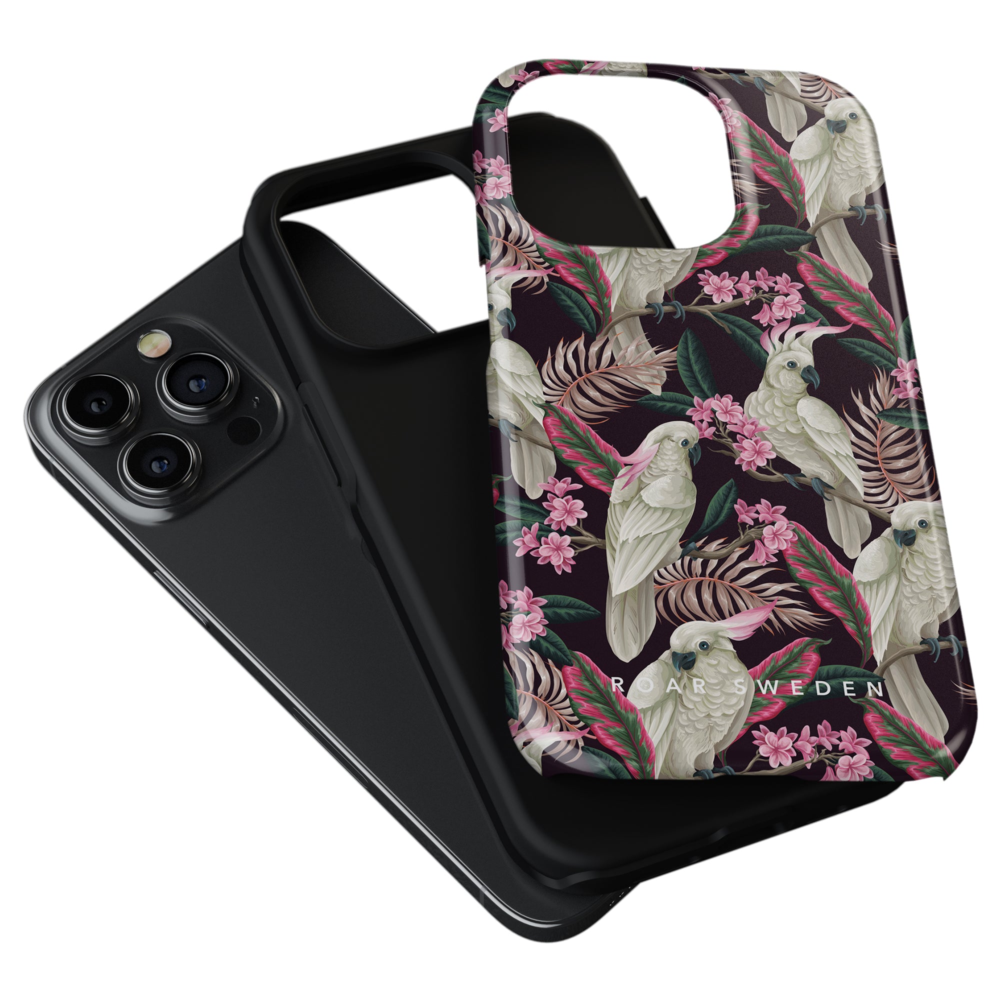 Two smartphone cases, one solid black and the other a Tough case from our Birds Collection featuring a vibrant floral and cockatoo design, are stacked against each other.