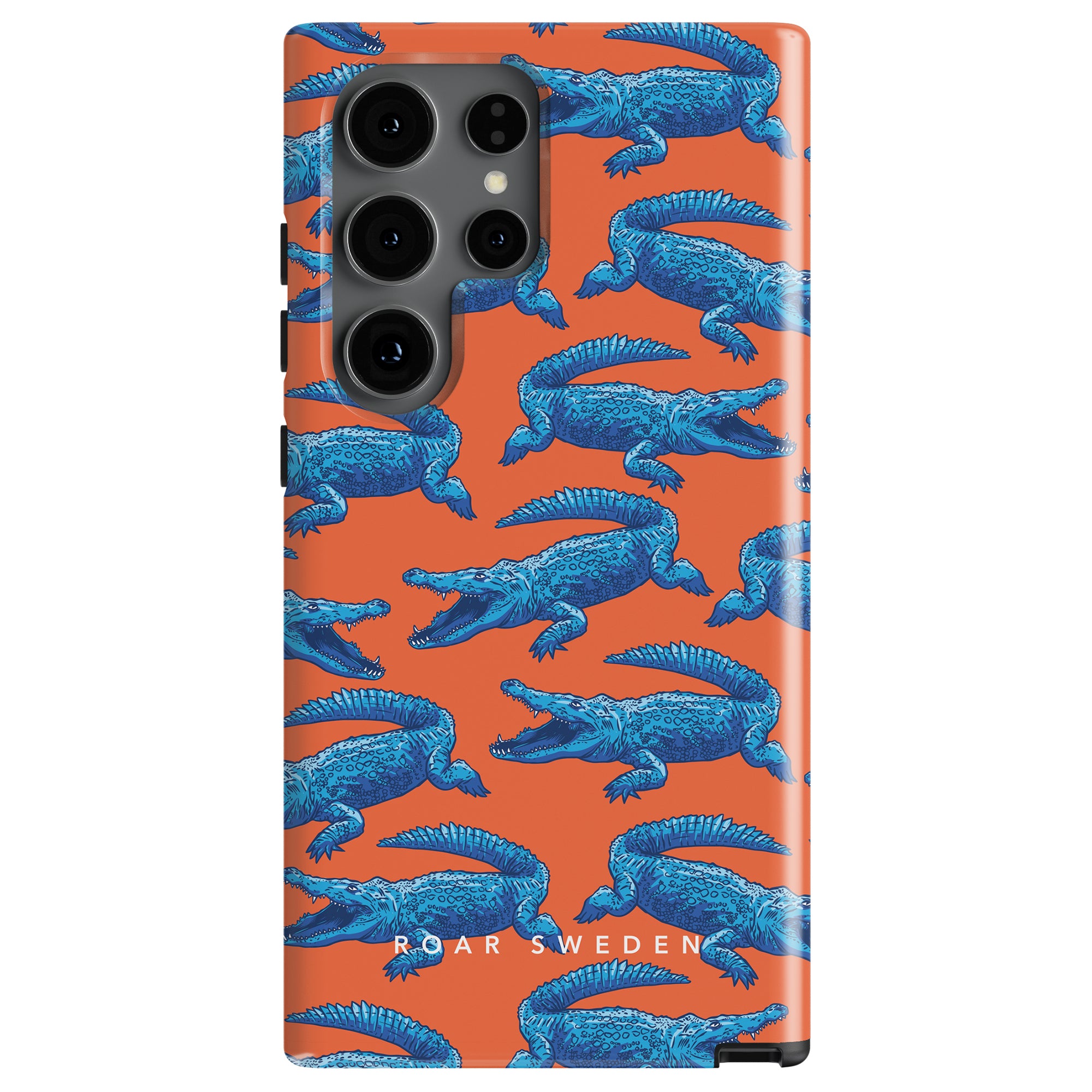 Introducing the Groovy Croc - Tough case, a stylish smartphone cover adorned with a pattern of blue alligators on an orange background. This eye-catching design is ideal for phones equipped with multiple rear cameras and features "ROAR SWEDEN" inscribed at the bottom. Elevate your phone's look with this trendy mobilskal and make it stand out!