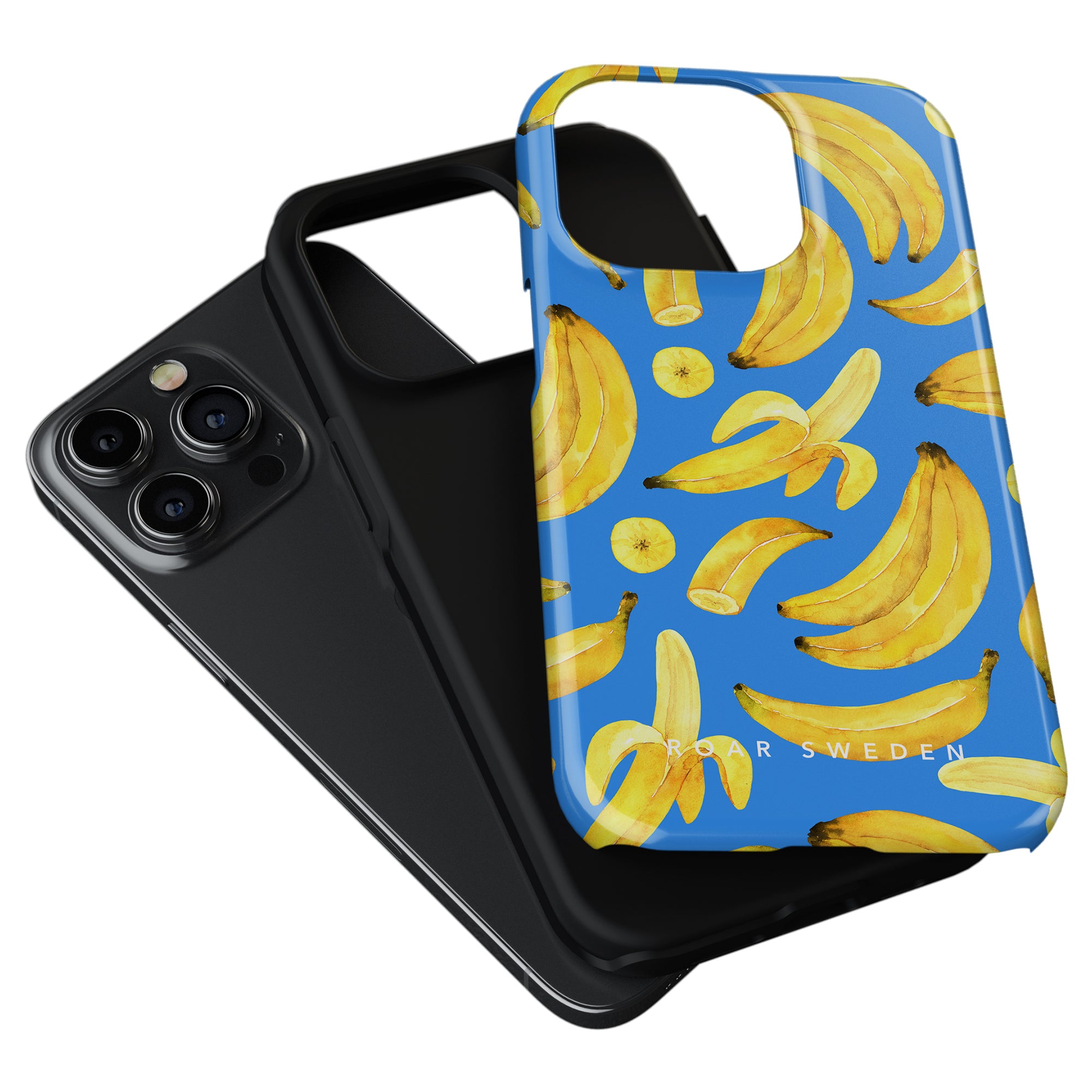 Rewritten Sentence: Two phone cases, one solid black and the other from the Ripe Bananas - Tough case with a blue background and a pattern of ripe bananas, are displayed near a black smartphone with multiple camera lenses.